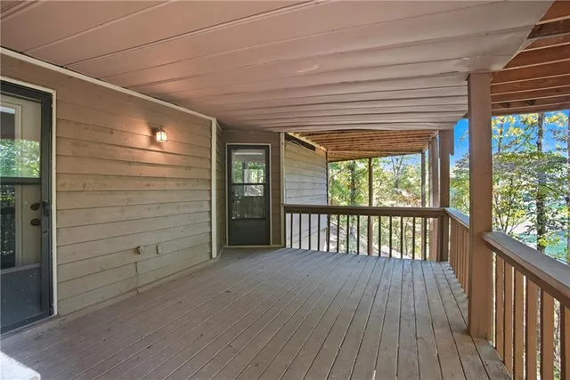a view of a patio with a table and chairs