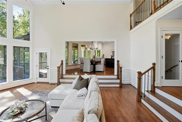 a living room with furniture and a rug
