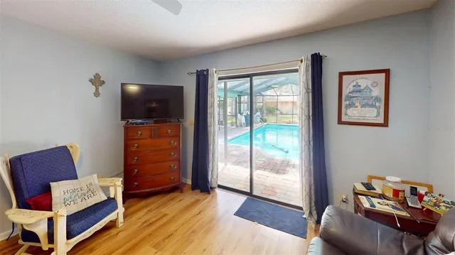 a living room with furniture and a window