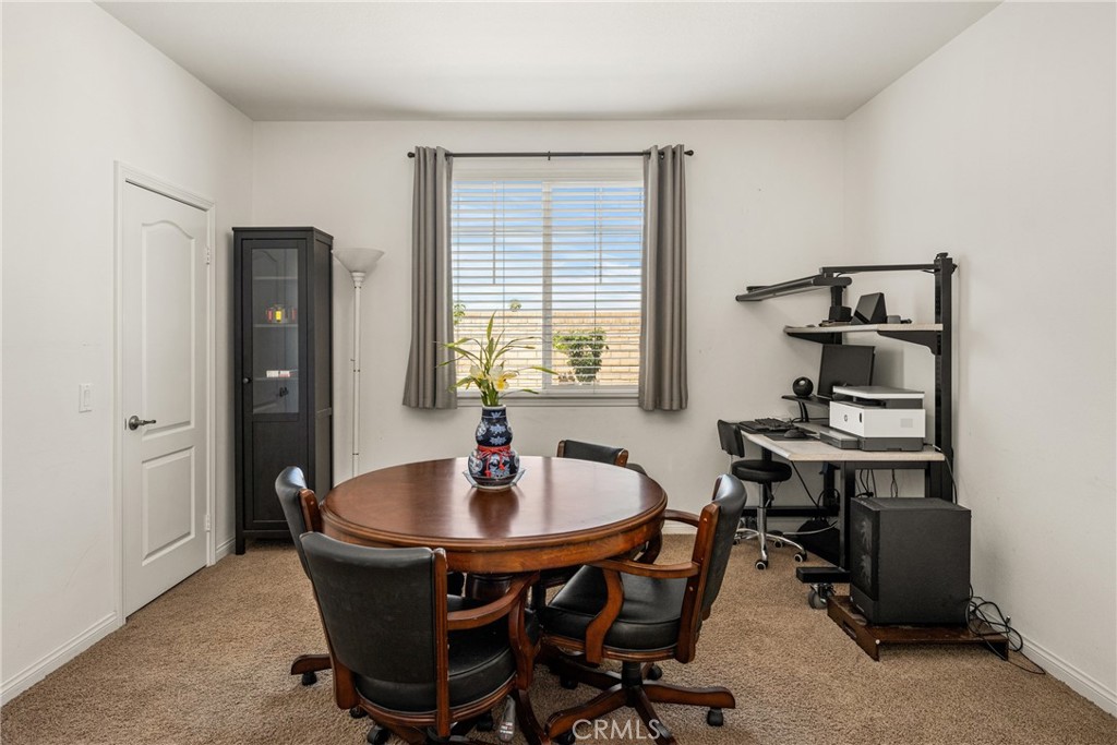 12652 Twin Peak Court Riverside, CA 92503 - Photo 19 of 55 a dining room with table and chairs