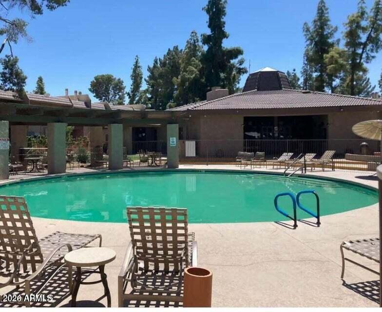 7436 East Chaparral Road, Unit B151 Scottsdale, AZ 85250 - Photo 15 of 19 a view of a yard with patio