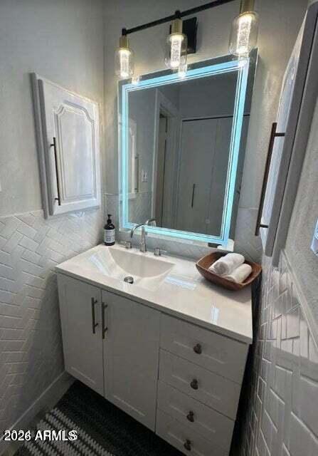 7436 East Chaparral Road, Unit B151 Scottsdale, AZ 85250 - Photo 9 of 19 a bathroom with a sink and a mirror