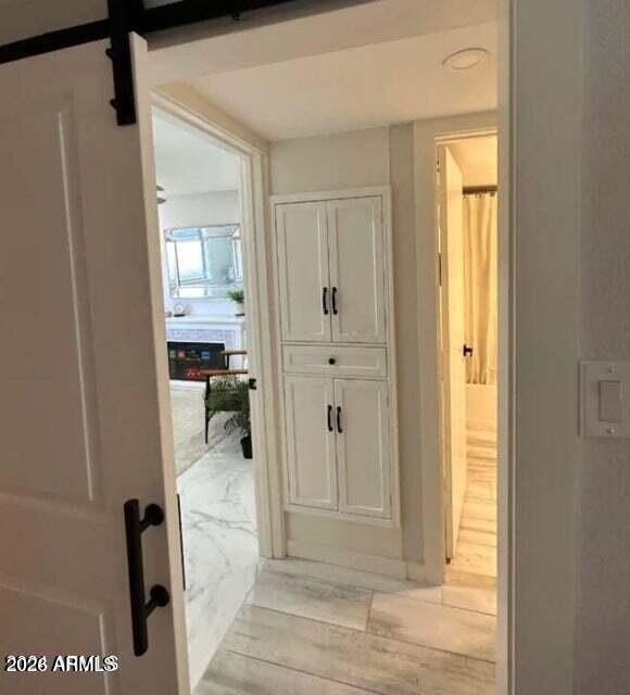 7436 East Chaparral Road, Unit B151 Scottsdale, AZ 85250 - Photo 10 of 19 a view of a hallway with bathroom and a shower