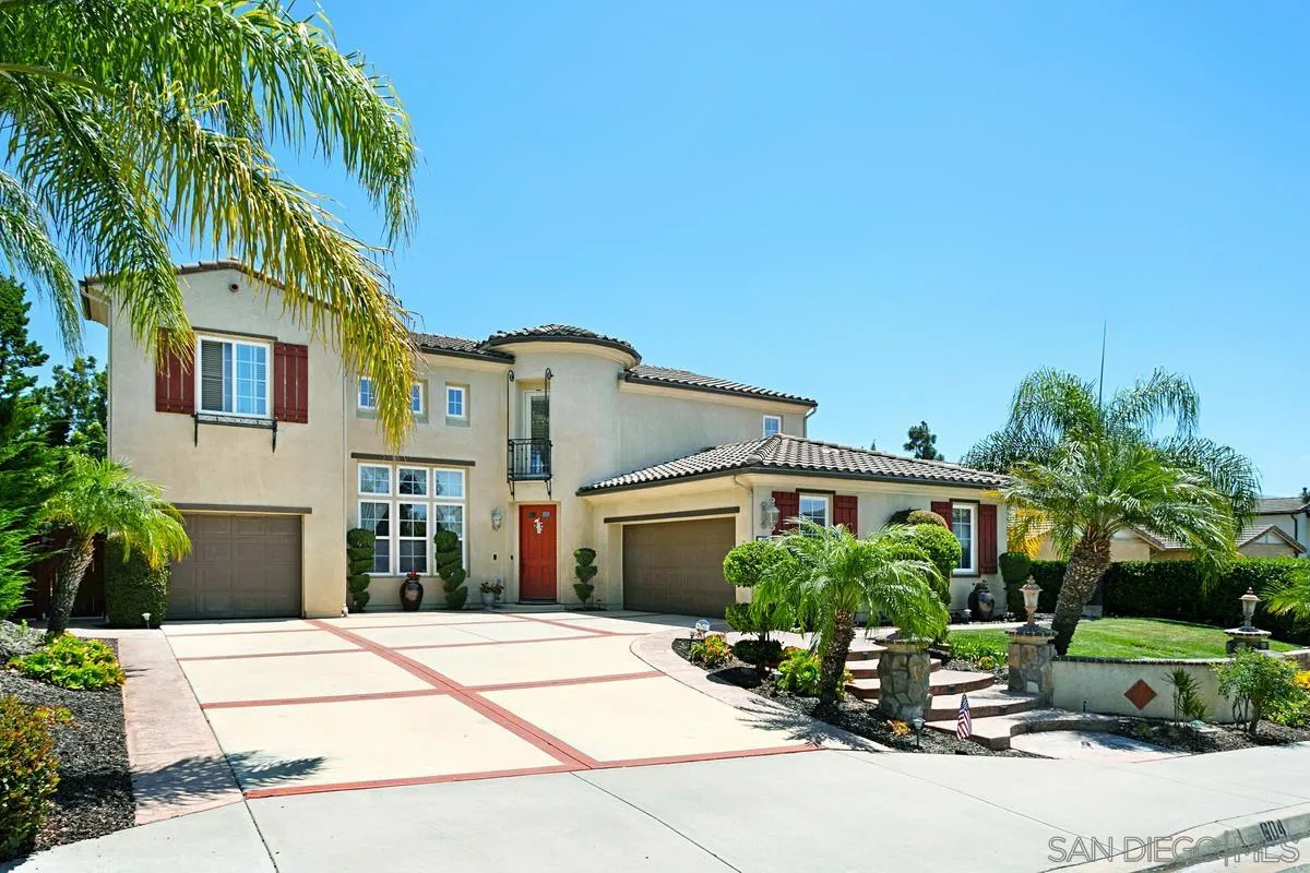 604 Hidden Trails Road Escondido, CA 92027 - Photo 2 of 49 a house view with a garden space
