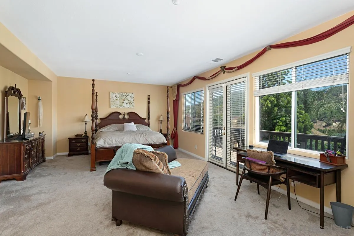 604 Hidden Trails Road Escondido, CA 92027 - Photo 31 of 49 a living room with furniture and a window