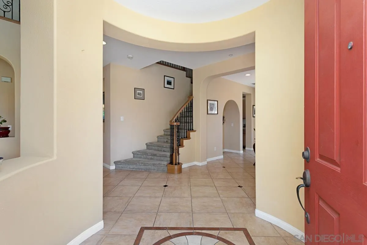 604 Hidden Trails Road Escondido, CA 92027 - Photo 4 of 49 a view of entryway and hall with a front door