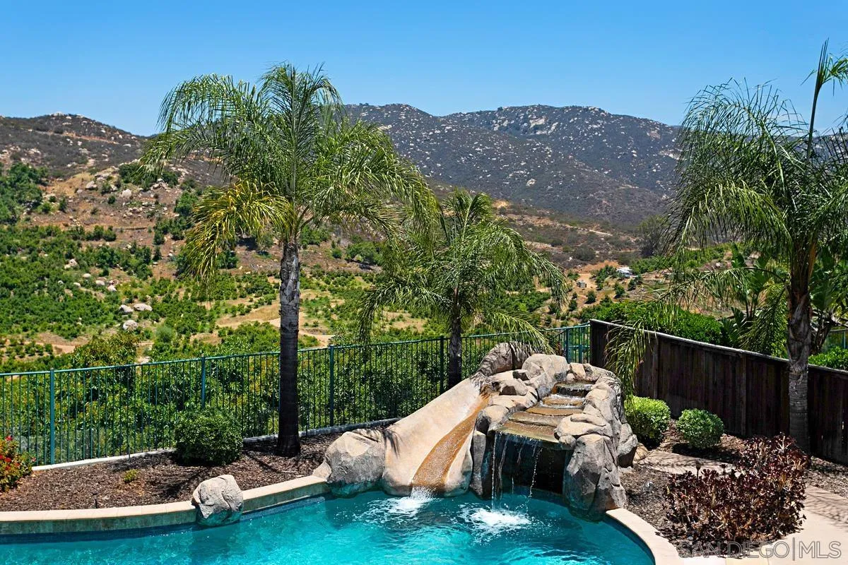 604 Hidden Trails Road Escondido, CA 92027 - Photo 41 of 49 a view of a terrace with a garden