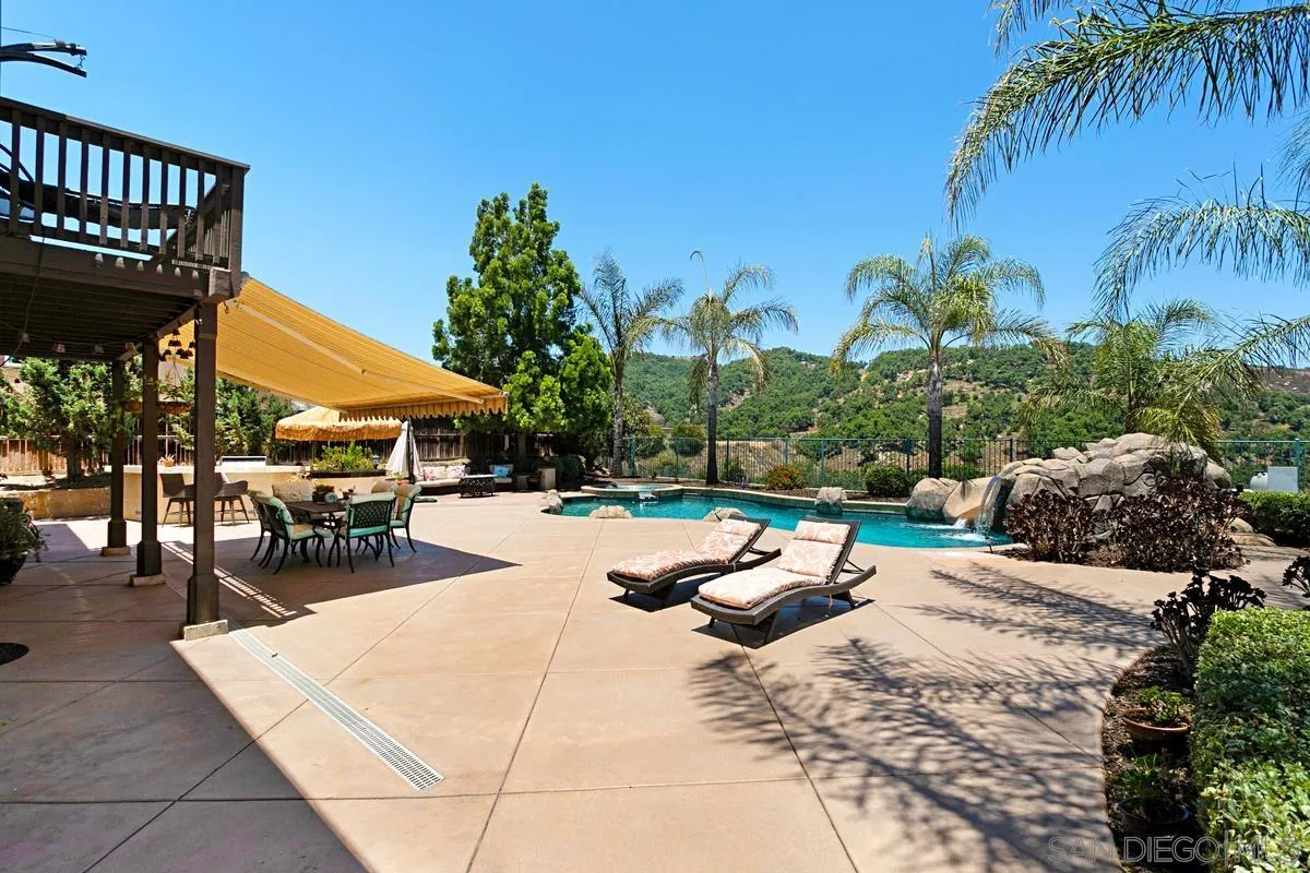 604 Hidden Trails Road Escondido, CA 92027 - Photo 48 of 49 a view of swimming pool with outdoor seating and plants