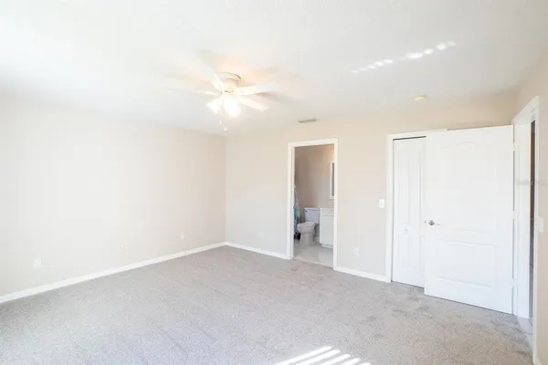 a view of a room with a hallway
