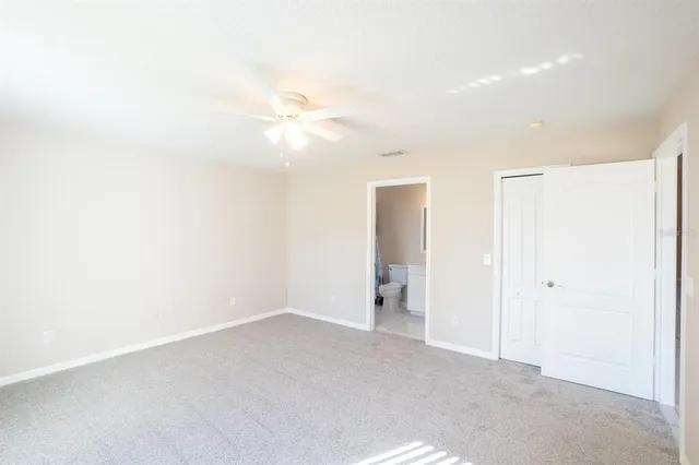 a view of a room with a hallway