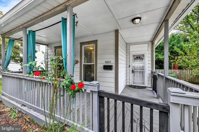 a view of a house with a flower garden