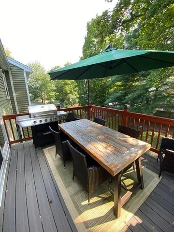 a view of balcony with furniture