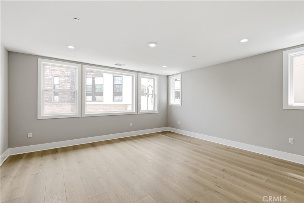 156 Apron Irvine, CA 92618 - Photo 17 of 40 a view of an empty room with a window