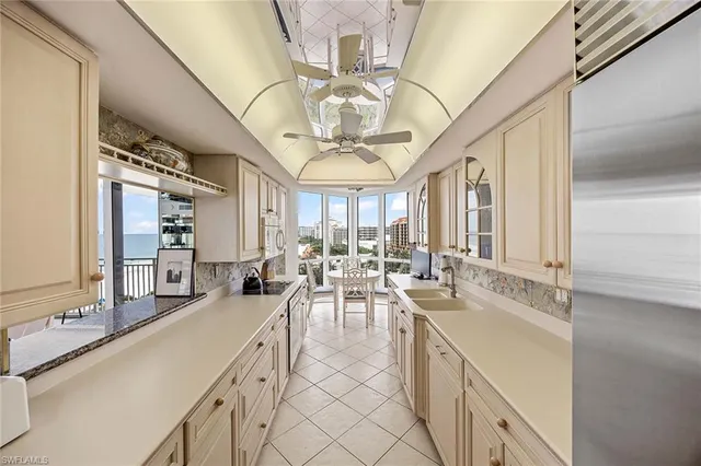 a very nice looking kitchen with a large window
