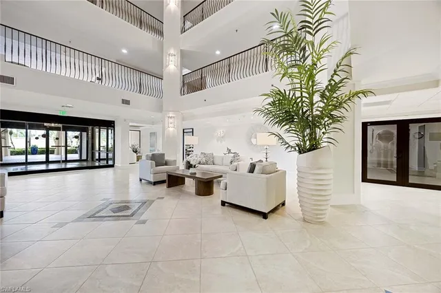 a living room with furniture and window