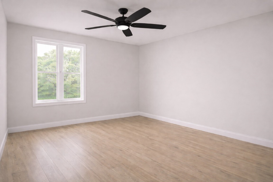 5315 Dewberry Street Houston, TX 77021 - Photo 5 of 6 an empty room with a window and a fan