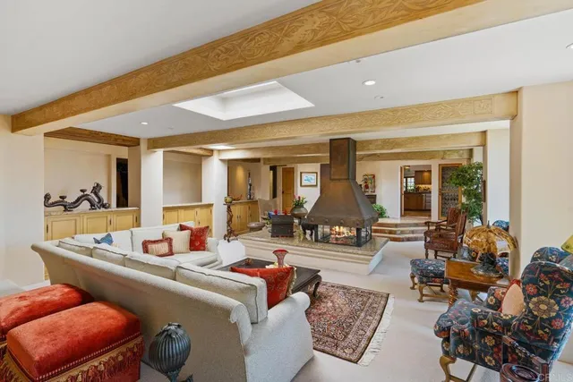 a room with furniture and a large window