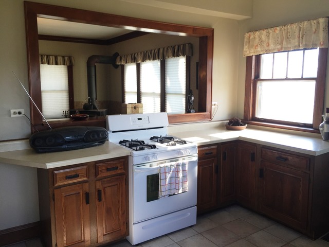 47 12n204 Il Route Hampshire, IL 60140 - Photo 18 of 25 a kitchen with a stove sink and window