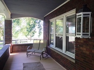 47 12n204 Il Route Hampshire, IL 60140 - Photo 7 of 25 a living room with furniture and a floor to ceiling window