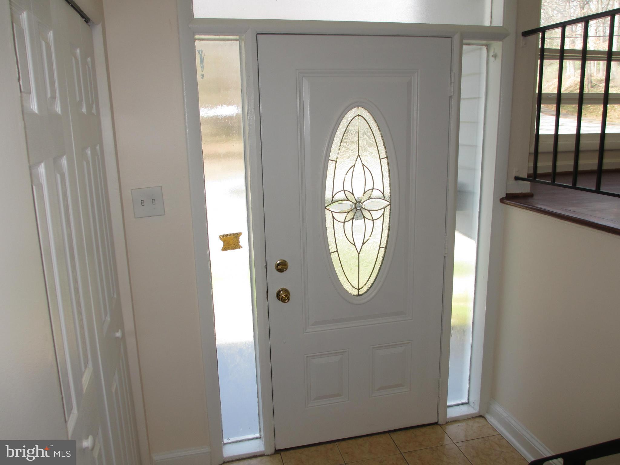9317 Avenel Road Silver Spring, MD 20903 - Photo 2 of 26 Foyer with new front door