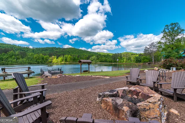 a view of a lake with a yard