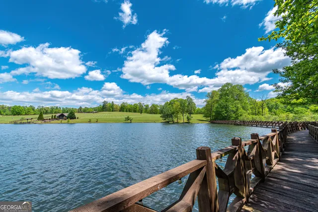 a view of a golf course with a lake