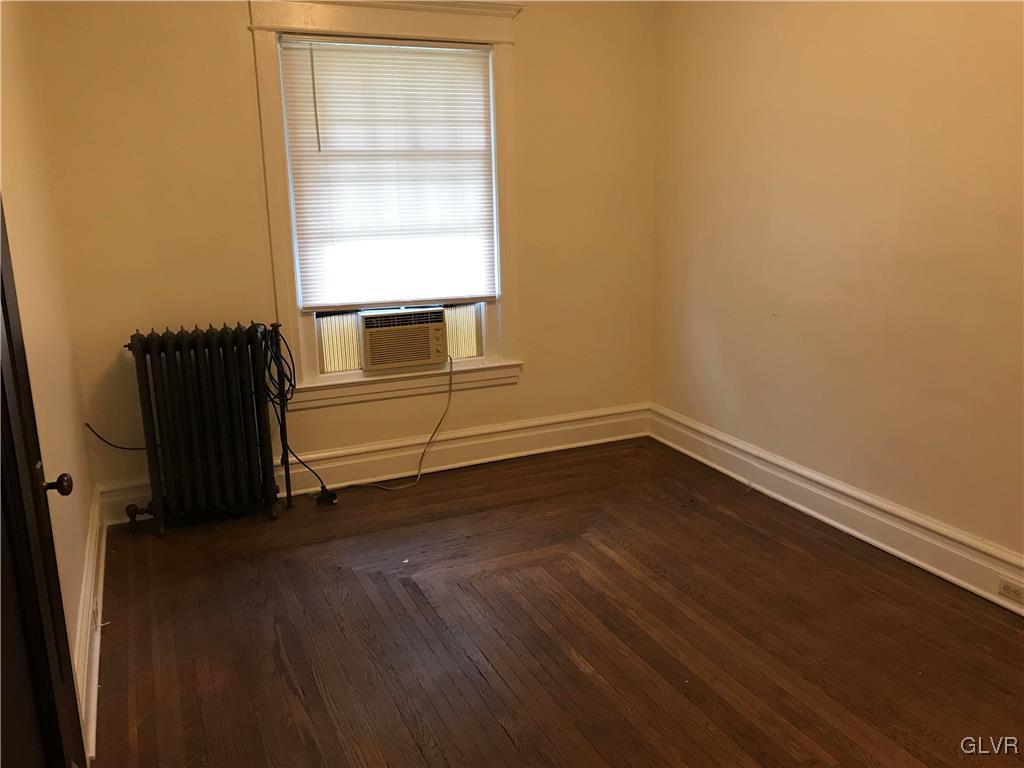 2122 Walnut Street, Unit D Allentown, PA 18104 - Photo 4 of 11 a view of an empty room and window