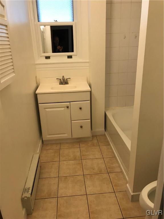 2122 Walnut Street, Unit D Allentown, PA 18104 - Photo 7 of 11 a bathroom with a sink toilet and tub