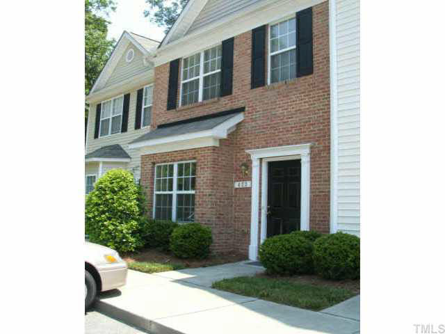 423 Alero Road Raleigh, NC 27610 - Photo 1 of 10 a brick building with a yard in front of it