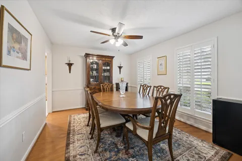 a view of a dining room with furniture