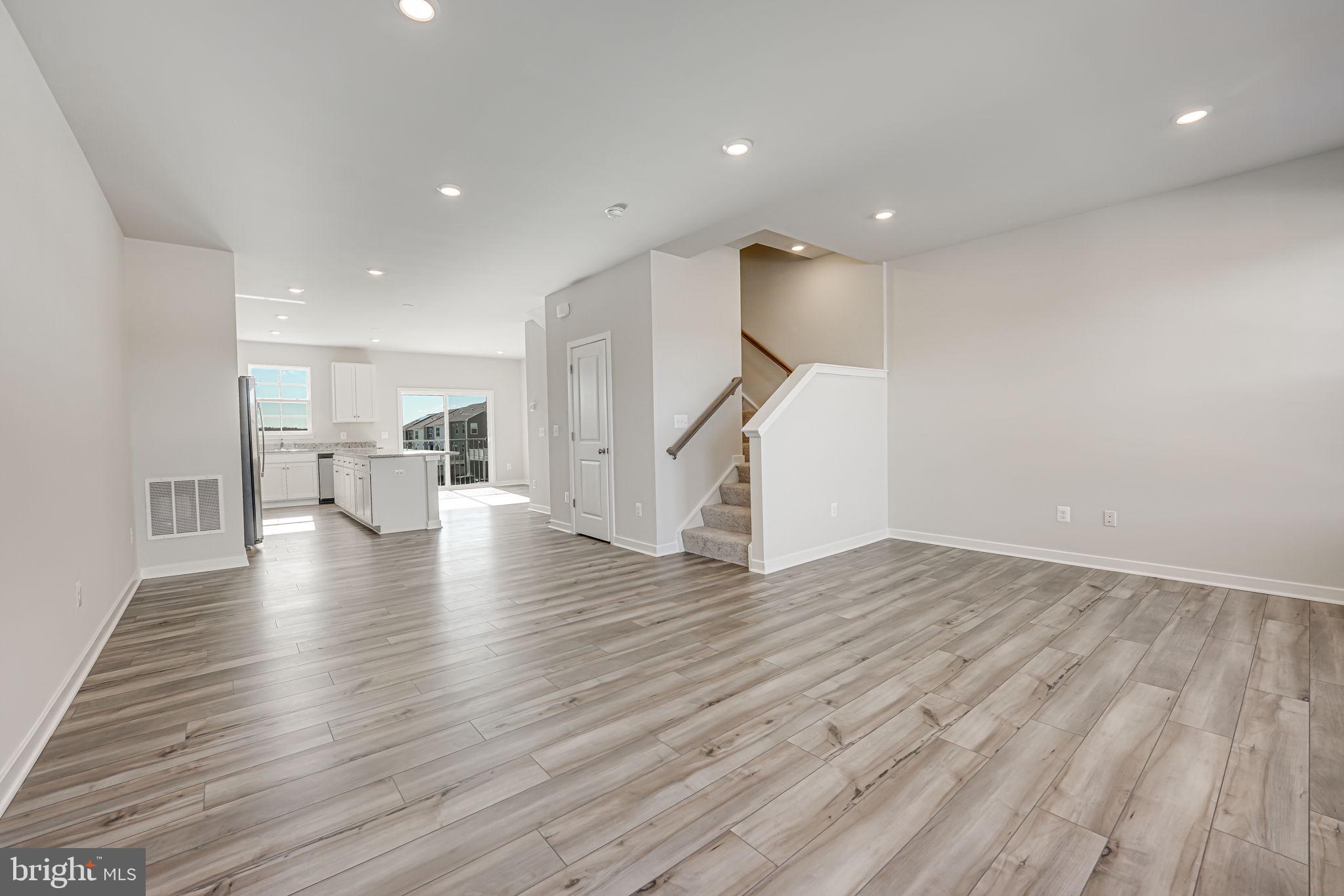19122 Isabel Boulevard Appomattox, VA 24522 - Photo 19 of 35 a view of empty room with wooden floor