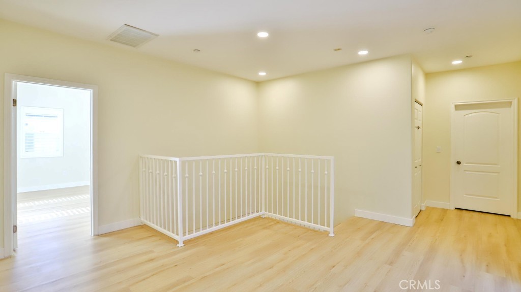12388 Arrowhead Street Stanton, CA 90680 - Photo 29 of 69 a view of a hallway