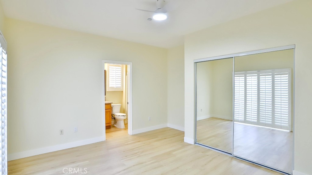 12388 Arrowhead Street Stanton, CA 90680 - Photo 47 of 69 an empty room with windows and closet