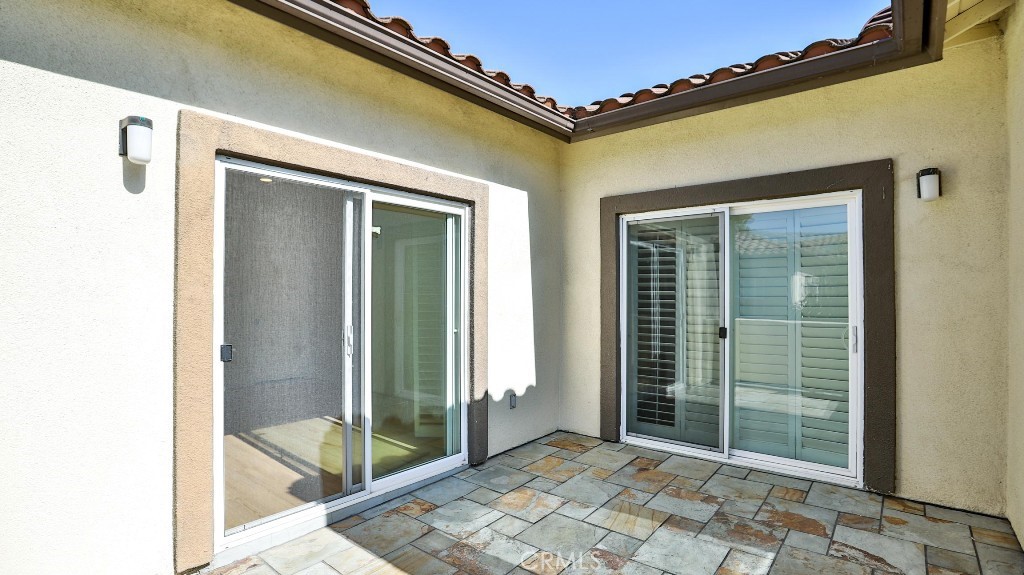 12388 Arrowhead Street Stanton, CA 90680 - Photo 56 of 69 a view of a bathroom with a glass door