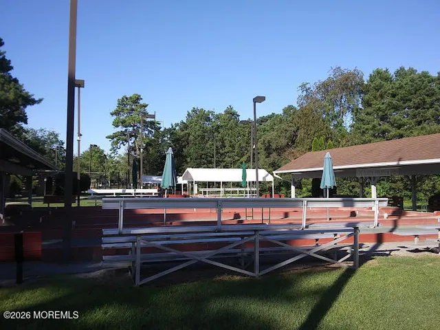 a view of a swimming pool with a patio