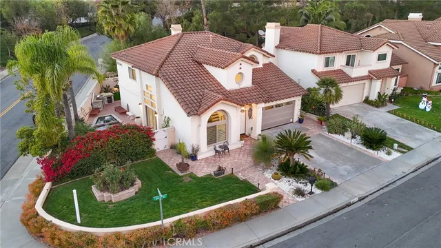 a front view of a house with a garage
