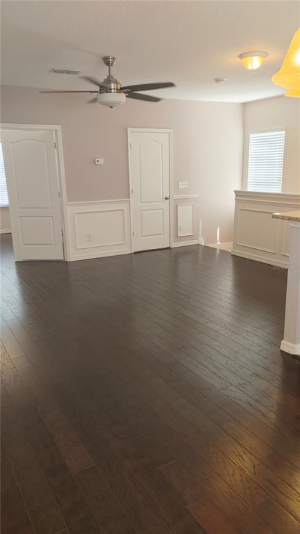 455 Old Farm Lane Winter Springs, FL 32708 - Photo 19 of 38 wooden floor in an empty room with a window
