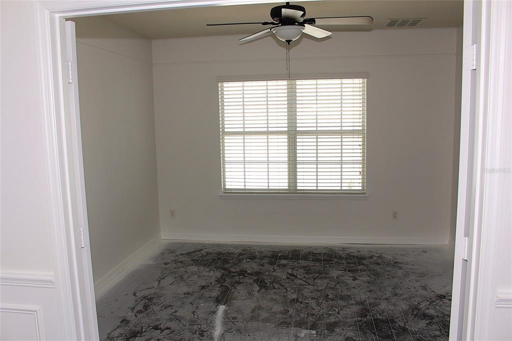 455 Old Farm Lane Winter Springs, FL 32708 - Photo 24 of 38 a view of a livingroom with a ceiling fan and window