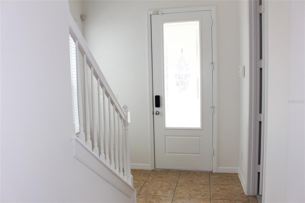 455 Old Farm Lane Winter Springs, FL 32708 - Photo 5 of 38 a view of an entryway with staircase