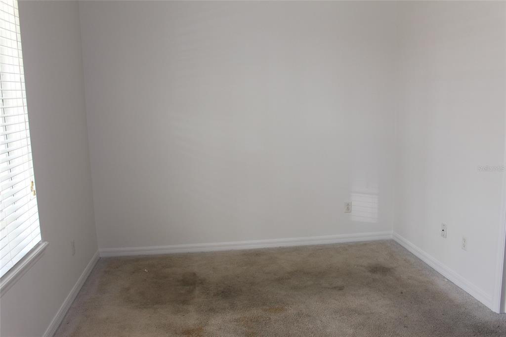 455 Old Farm Lane Winter Springs, FL 32708 - Photo 8 of 38 a room that has a window in it