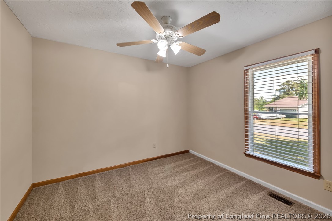 5262 Marvin Drive Spring Lake, NC 28390 - Photo 17 of 23 a view of an empty room with a window