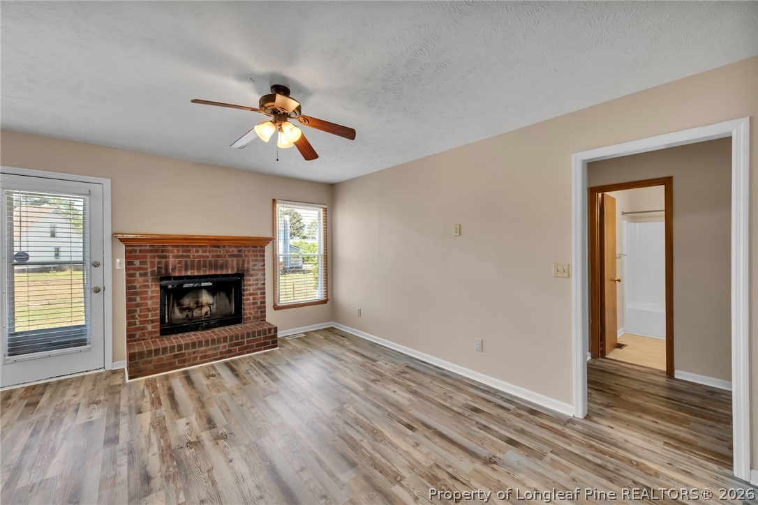 5262 Marvin Drive Spring Lake, NC 28390 - Photo 8 of 23 a view of a livingroom with a fireplace and window