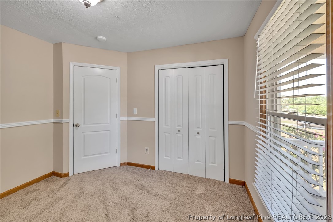 5262 Marvin Drive Spring Lake, NC 28390 - Photo 10 of 23 a view of an empty room with a window