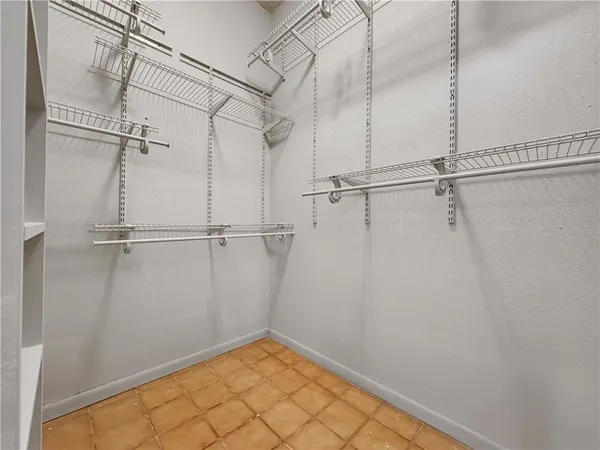 a view of a room with racks on the wall