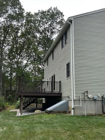 a backyard of a house with lots of green space