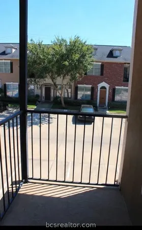 a view of porch with a yard