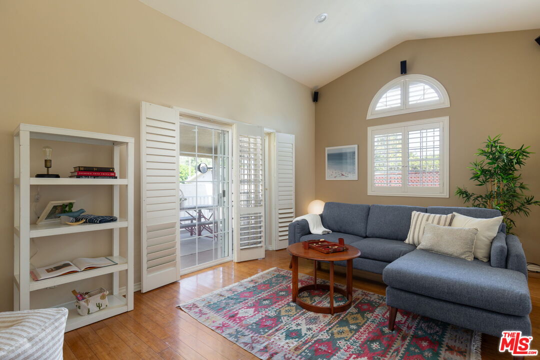 3810 Hauser Boulevard Los Angeles, CA 90008 - Photo 13 of 32 a living room with furniture and wooden floor
