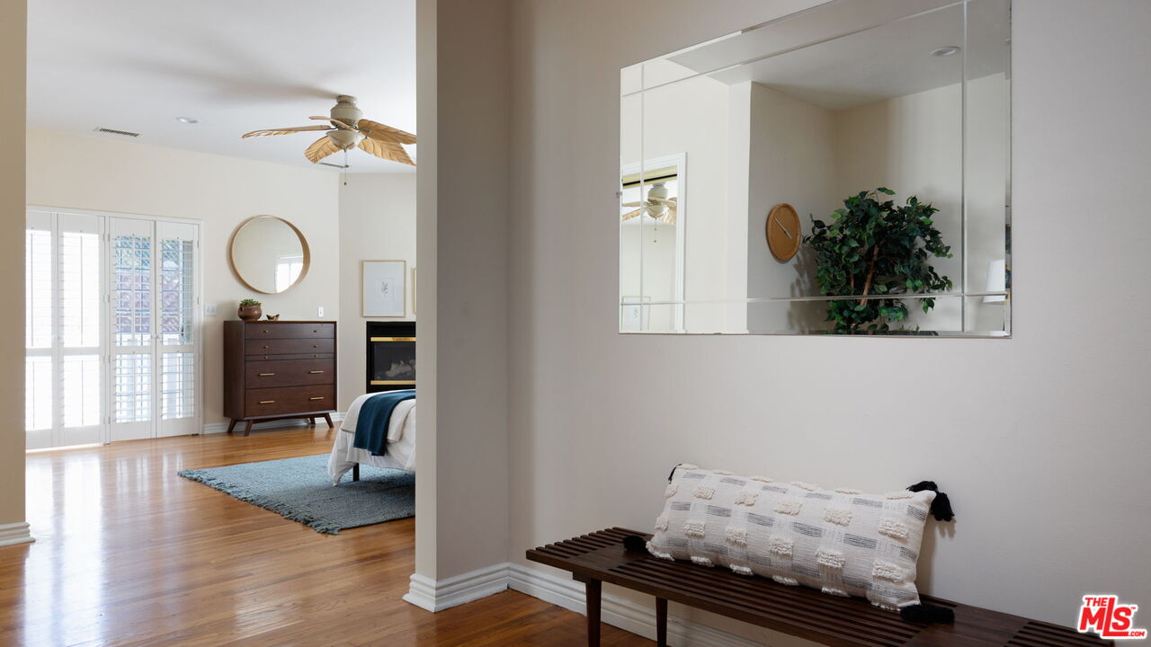 3810 Hauser Boulevard Los Angeles, CA 90008 - Photo 15 of 32 a view of a workspace with furniture and wooden floor