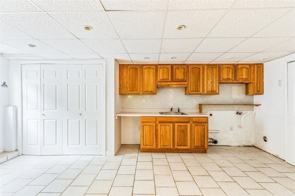 17 Brentwood Road Kingston, MA 02364 - Photo 22 of 33 a kitchen with stainless steel appliances granite countertop a sink and cabinets