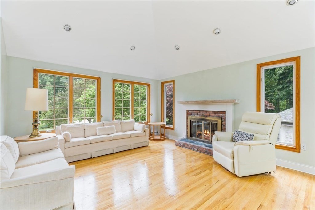 17 Brentwood Road Kingston, MA 02364 - Photo 7 of 33 a living room with furniture and a fireplace
